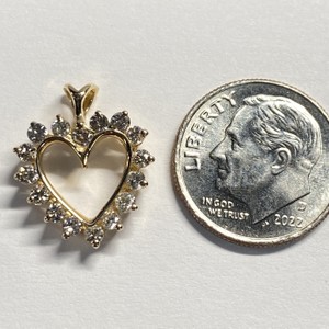  YG 14kt 1.44g Pendant Heart w/ Dias - No Chain